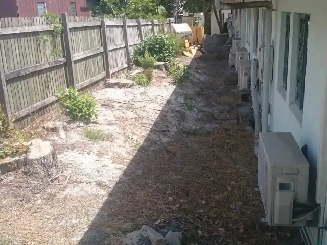 Residential block, many stumps – before - Gympie Stump Grinding